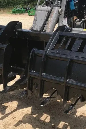 skid steer- Talon/Clamshell Grapples Save Now